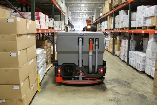 PowerBoss Nautilus Scrubber Cleaning Warehouse Aisle